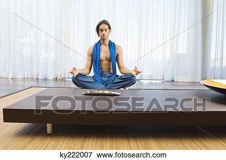 Man practicing yoga View Large Photo Image Stock Photo - Man practicing yoga. Fotosearch