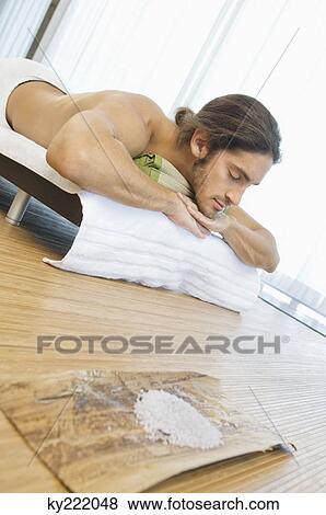 Man receiving spa treatment View Large Photo Image Stock Photo - Man receiving spa treatment. Fotosearch