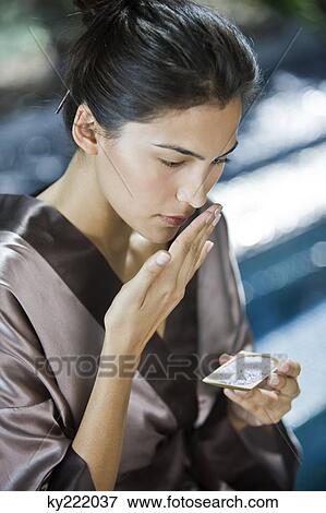 Woman smelling bath salt View Large Photo Image Stock Photo - Woman smelling bath salt. Fotosearch
