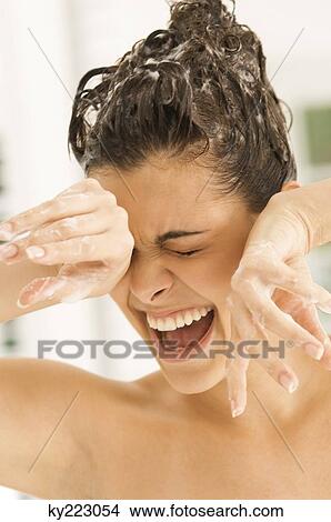 Close-up of a woman shouting with her eyes closed View Large Photo Image Picture - Close-up of a woman shouting with her eyes closed. Fotosearch