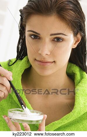 Portrait of a woman mixing hair color View Large Photo Image Stock Image - Portrait of a woman mixing hair color. Fotosearch