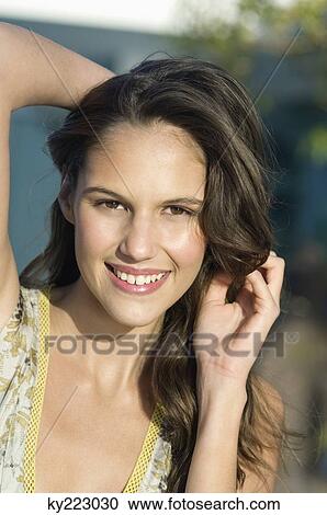 Portrait of a woman smiling View Large Photo Image Stock Image - Portrait of a woman smiling. Fotosearch