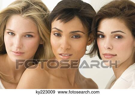 Stock Photo - Portrait of three female friends. Fotosearch