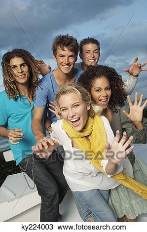 Portrait of five friends looking cheerful View Large Photo Image Stock Image - Portrait of five friends looking cheerful. Fotosearch