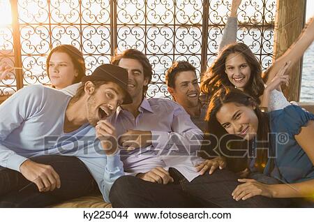 Friends having fun on vacation View Large Photo Image Picture - Friends having fun on vacation. Fotosearch