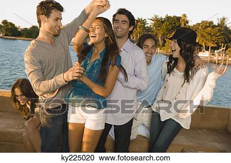 Friends having fun on vacation View Large Photo Image Stock Image - Friends having fun on vacation. Fotosearch