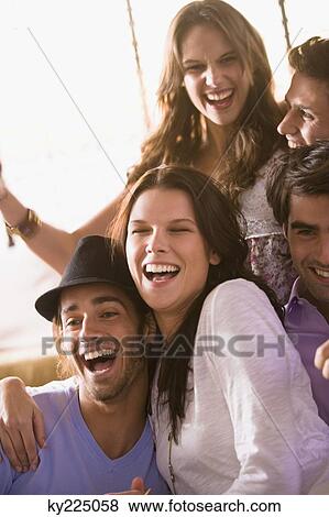 Friends having fun on vacation View Large Photo Image Stock Photo - Friends having fun on vacation. Fotosearch