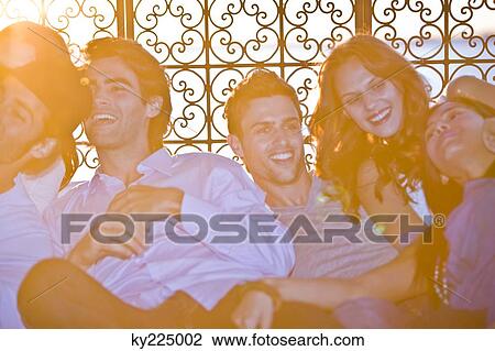 Group of friends enjoying at a tourist resort View Large Photo Image Stock Image - Group of friends enjoying at a tourist resort. Fotosearch