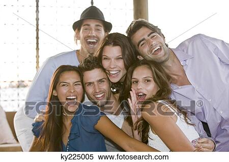 Group of friends smiling together View Large Photo Image Stock Photography - Group of friends smiling together. Fotosearch