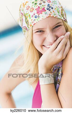 Close-up of a woman smiling View Large Photo Image Stock Image - Close-up of a woman smiling. Fotosearch
