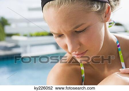 Close-up of a woman thinking View Large Photo Image Stock Image - Close-up of a woman thinking. Fotosearch