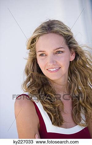 Close-up of a woman smiling View Large Photo Image Stock Image - Close-up of a woman smiling. Fotosearch
