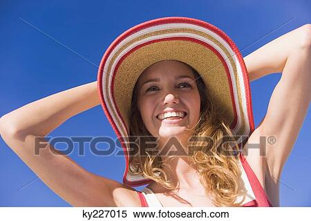 Close-up of a woman smiling View Large Photo Image Stock Photography - Close-up of a woman smiling. Fotosearch