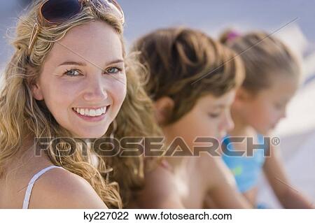 Portrait of a woman smiling View Large Photo Image Stock Image - Portrait of a woman smiling. Fotosearch