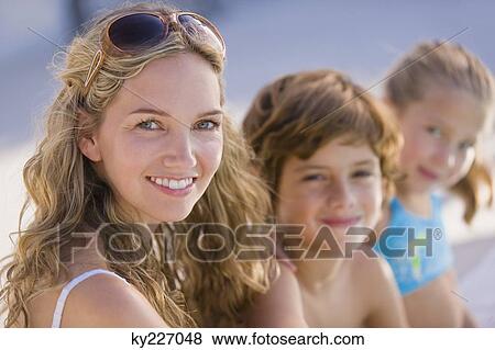 Stock Photo - Portrait of a woman smiling. Fotosearch
