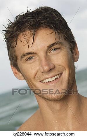Picture - Portrait of a man smiling. Fotosearch
