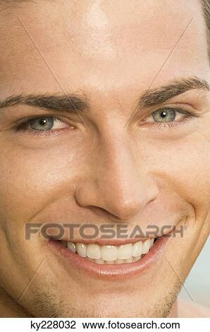 Portrait of a man smiling View Large Photo Image Stock Image - Portrait of a man smiling. Fotosearch