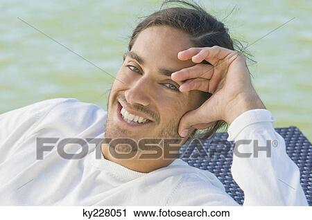 Portrait of a man smiling View Large Photo Image Stock Image - Portrait of a man smiling. Fotosearch