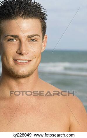 Portrait of a man smiling View Large Photo Image Stock Photo - Portrait of a man smiling. Fotosearch