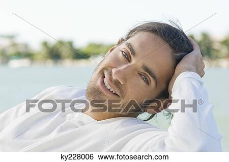 Portrait of a man smiling View Large Photo Image Stock Photograph - Portrait of a man smiling. Fotosearch