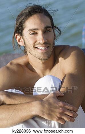 Stock Photograph - Portrait of a man smiling. Fotosearch