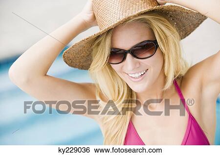 Close-up of a woman smiling View Large Photo Image Stock Photograph - Close-up of a woman smiling. Fotosearch