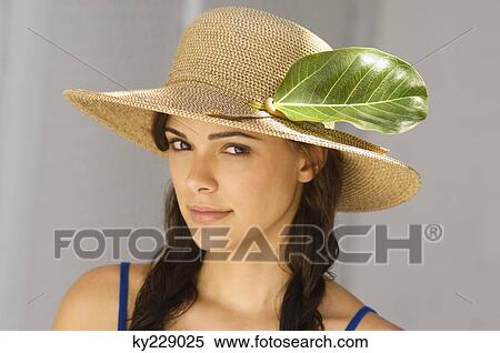Portrait of a woman wearing hat View Large Photo Image Stock Photography - Portrait of a woman wearing hat. Fotosearch