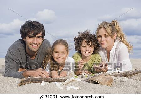 Family on the beach View Large Photo Image Stock Image - Family on the beach. Fotosearch