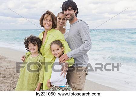 Family on the beach View Large Photo Image Stock Image - Family on the beach. Fotosearch