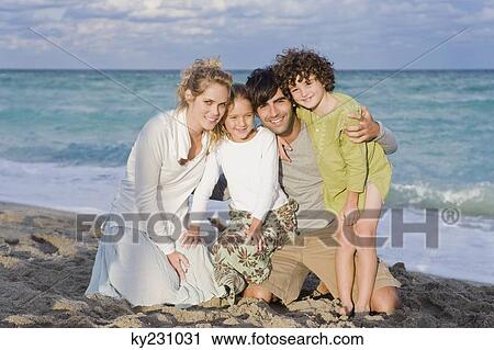Portrait of a family smiling View Large Photo Image Stock Image - Portrait of a family smiling. Fotosearch