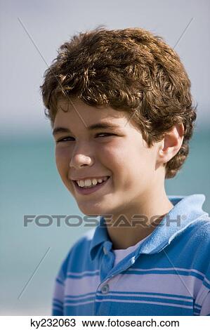 Portrait of a boy smiling View Large Photo Image Stock Image - Portrait of a boy smiling. Fotosearch