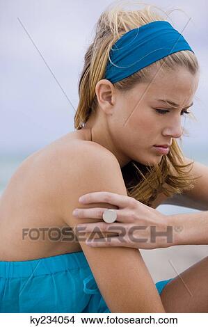 Close-up of a woman thinking View Large Photo Image Picture - Close-up of a woman thinking. Fotosearch
