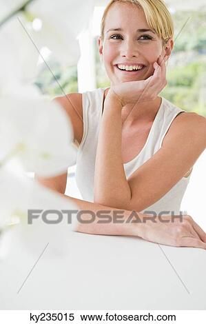 Close-up of a woman smiling View Large Photo Image Stock Photography - Close-up of a woman smiling. Fotosearch