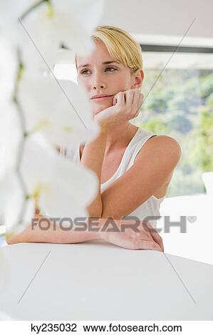 Close-up of a woman thinking View Large Photo Image Stock Image - Close-up of a woman thinking. Fotosearch