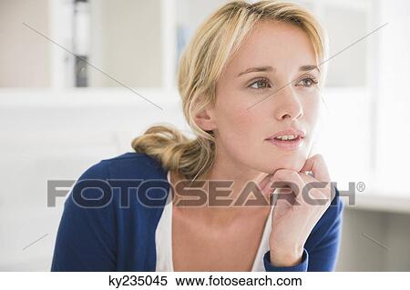 Close-up of a woman thinking View Large Photo Image Stock Photography - Close-up of a woman thinking. Fotosearch