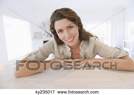 Portrait of a woman smiling View Large Photo Image Stock Photo - Portrait of a woman smiling. Fotosearch