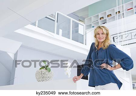 Stock Photo - Portrait of a woman smiling. Fotosearch