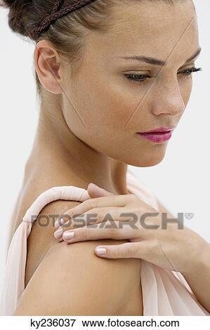 Close-up of a fashion model posing View Large Photo Image Stock Photo - Close-up of a fashion model posing. Fotosearch