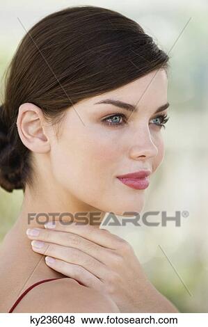 Close-up of a fashion model posing View Large Photo Image Stock Photo - Close-up of a fashion model posing. Fotosearch