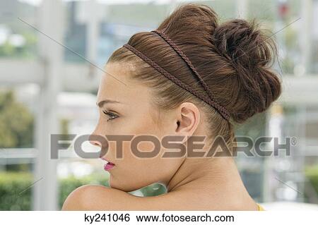 Close-up of a fashion model posing View Large Photo Image Stock Photograph - Close-up of a fashion model posing. Fotosearch
