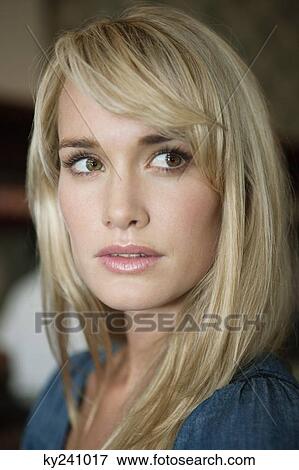 Close-up of a woman thinking in a cafe View Large Photo Image Stock Photo - Close-up of a woman thinking in a cafe. Fotosearch