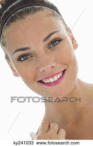 Stock Image - Portrait of a fashion model smiling. Fotosearch
