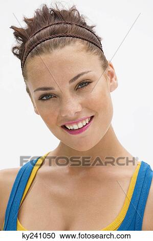 Stock Image - Portrait of a fashion model smiling. Fotosearch