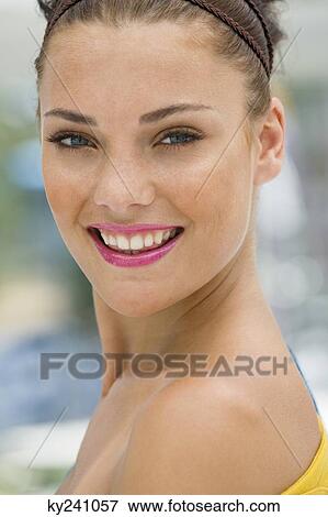 Portrait of a fashion model smiling View Large Photo Image Stock Photo - Portrait of a fashion model smiling. Fotosearch