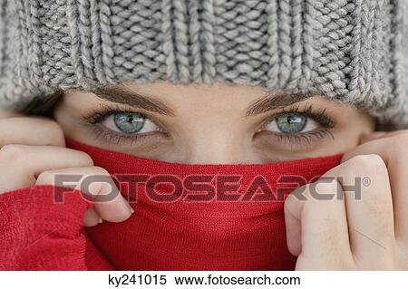 Portrait of a woman covering her face View Large Photo Image Stock Photography - Portrait of a woman covering her face. Fotosearch