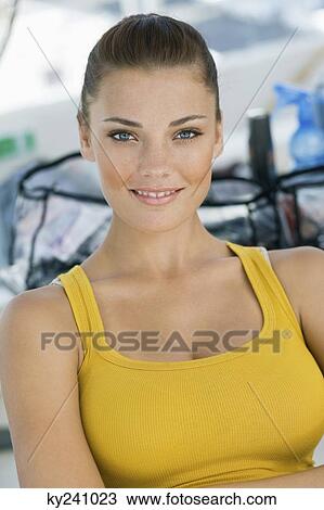 Stock Image - Portrait of a woman smiling. Fotosearch
