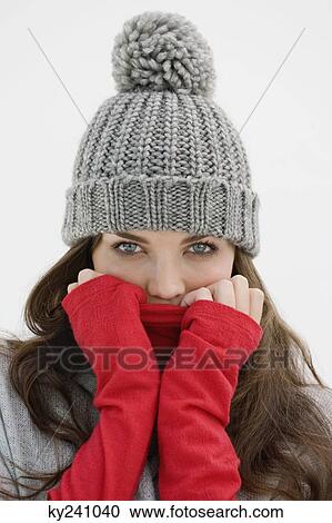 Portrait of a woman wearing warm clothing View Large Photo Image Stock Image - Portrait of a woman wearing warm clothing. Fotosearch