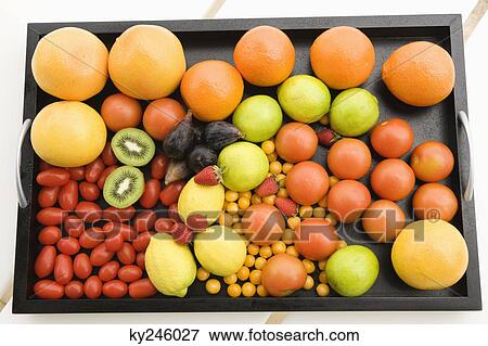 Fruits and vegetables in a tray View Large Photo Image Stock Photo - Fruits and vegetables in a tray. Fotosearch