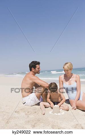Family on vacations on the beach View Large Photo Image Stock Image - Family on vacations on the beach. Fotosearch