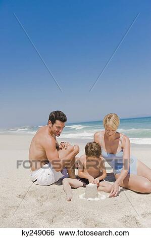 Family on vacations on the beach View Large Photo Image Stock Photograph - Family on vacations on the beach. Fotosearch